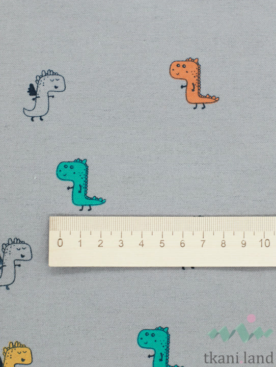 FL0193 Фланель «Разноцветные динозаврики на сером»