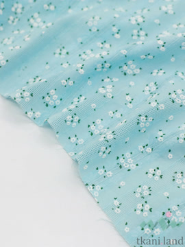 AM0040 Ажурный хлопок (батист) «Белые цветочки» на голубом